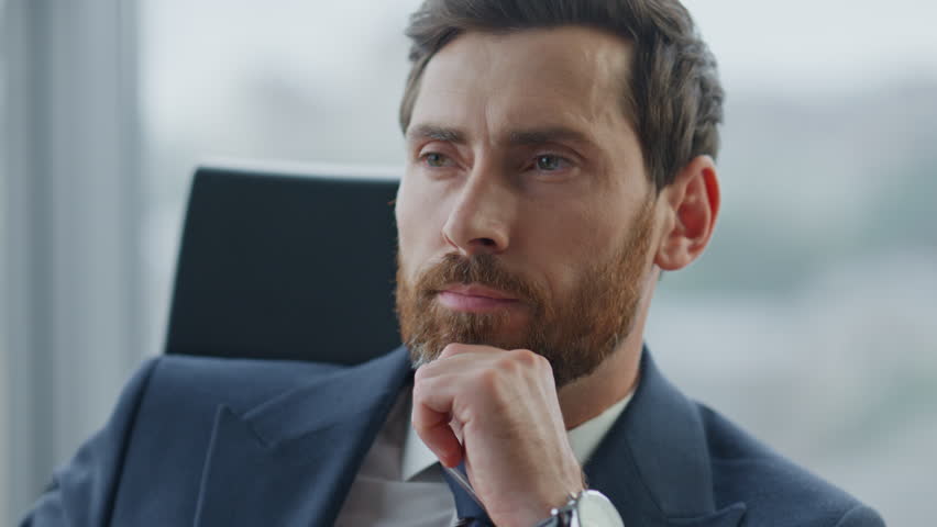 Portrait of bearded man working office in elegant suit. Thoughtful businessman thinking about business deal profitable investment company perspectives. Ceo manager contemplating strategy close up. | Shutterstock HD Video #1098288475