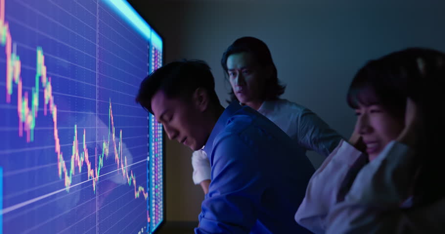 Asian stock market analyst facing economic crisis losing money | Shutterstock HD Video #1098294485