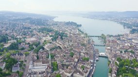 Inscription on video. Zurich, Switzerland. Panorama of the city from the air. View of Zurich Lake. On the mechanical display, Aerial View