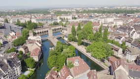 Inscription on video. Strasbourg, France. Quarter Petite France, Vauban Dam. Appears from the sand, Aerial View