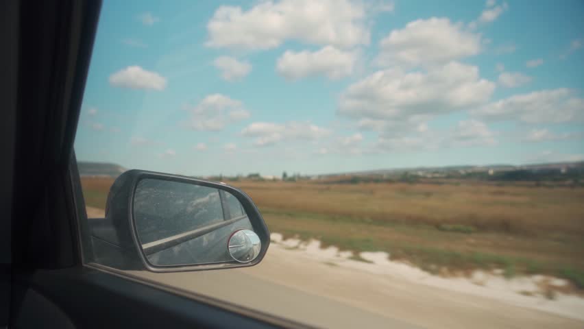 Road trip. view from Driving Car. Car speeding on a road. side window motion view. Moving scenery.
 | Shutterstock HD Video #1098307851