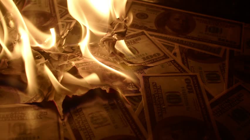Bunch of dollar bills burns with bright flame, closeup. Concept of loss of wealth and lack of money Royalty-Free Stock Footage #1098309003