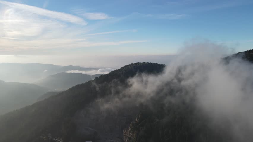 An aerial view of  thick clouds over the Black forest and landscape in Germany