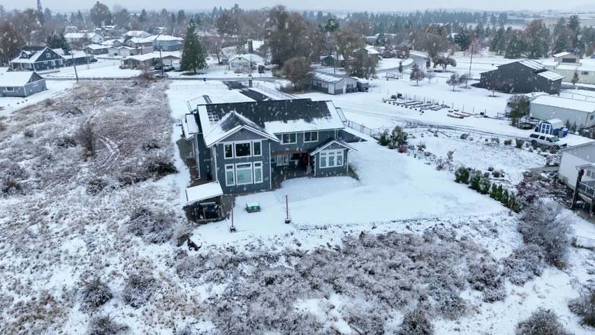 Private craftsman house covered in snow in Spokane, Washington.