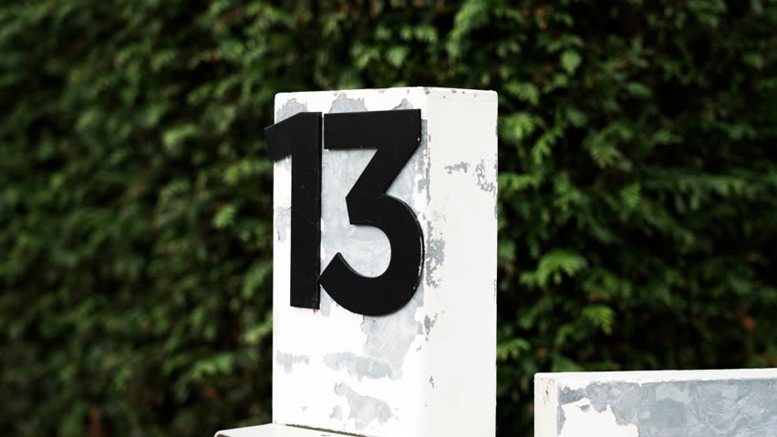 House number thirteen. Superstition idea. Halloween dark vintage view