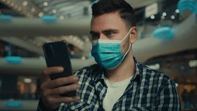 Businessman in medical mask caucasian man chatting online on smartphone scrolling internet website use mobile phone sick male protect face from coronavirus infection quarantine rules in shopping mall