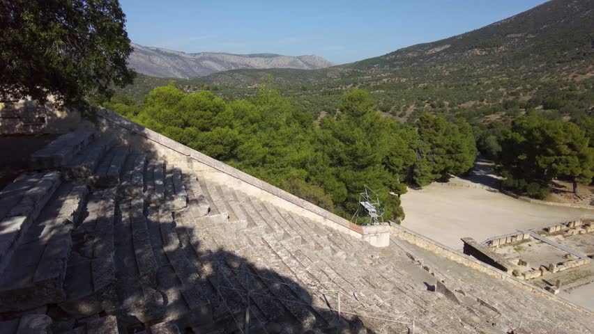 Walking around the amphitheater Kinortio Oros, Epidavros in Greece on a sunny morning. 