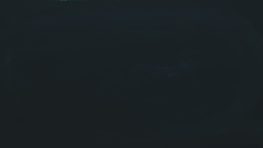 Timelapse close-up: a child hand draws a tank with chalk on a blackboard and crosses it out. Anti-war, no war, peacemaking concept