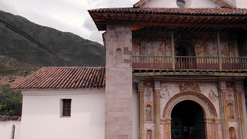 Aerial drone sideways view of Saint Peter the Apostle Church in Andahuaylillas, Peru