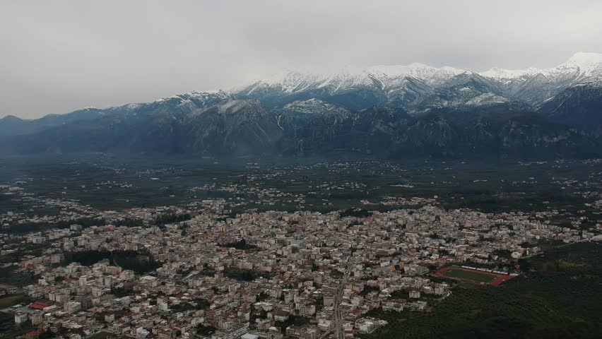 Aerial view city over Sparti city Greece with the snowy Taygetus Mountain in the background Laconia, Greece