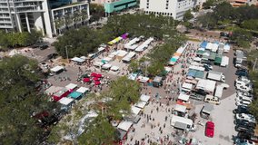 4K Aerial Drone Slow Motion Video of Shoppers at Farmers Market in Downtown St. Petersburg, FL