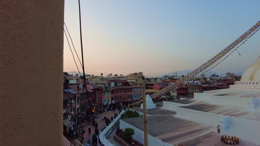 Kathmandu, Nepal: A panoramic view of the famous Budhanath stupa, a buddhist monument, in Kathmandu city, Nepal capital city at sunset