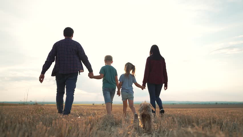 Happy active lifestyle. Family walk in summer park. Happy family parents, children walk together along the meadow of the park.Happy family children. Summer travel go everywhere. | Shutterstock HD Video #1098379291