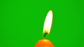 Candle single burning on fire flame slow motion on green screen background, yellow candle fire light close up, praying religion of people for celebration of light on candles, vedio for creative - Powered by Shutterstock - Get 15% off with code: PIKWIZARD15