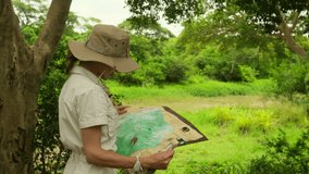 Young traveler woman looking at map. Young hiker traveling and hiking alone, female using map and wearing backpack. Summer tourism, wild nature. woman traveler with a backpack stands near a giraffe - Powered by Shutterstock - Get 15% off with code: PIKWIZARD15