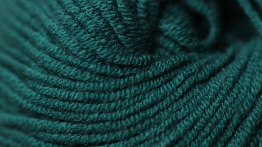 a tangle with woolen threads rotates in a circle Royalty-Free Stock Footage #1098408393