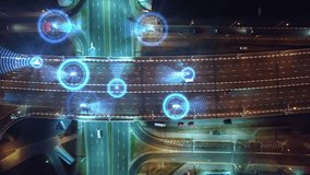Smart city of the future at night. View from above at self driving cars on a road intersection. Autonomous driving systems, control vehicles through artificial intelligence. Animation of road scanning - Powered by Shutterstock - Get 15% off with code: PIKWIZARD15