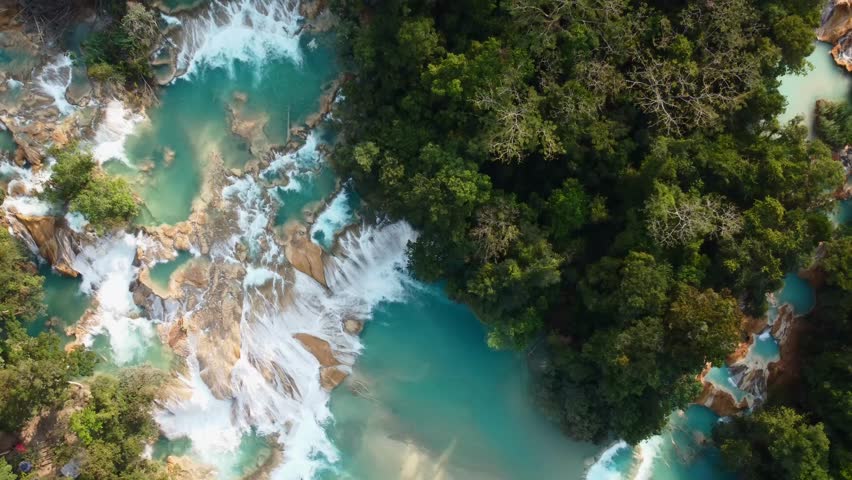 Aerial view of the tropical waterfall Agua Azul, Mexico on a sunny day Royalty-Free Stock Footage #1098425391