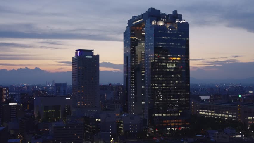 Umeda Sky Building and Sunset over Osaka Skyline in the Early Evening, Japan