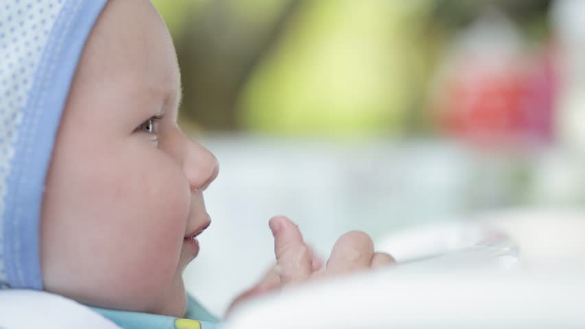 Mother feeds small child healthy food from spoon. Feeding baby cream soup. Healthy child nutrition. | Shutterstock HD Video #1098444117