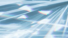 Scientific Optical Equipment. Loop. The optical lens system creates a series of bright, changing geometric highlights on a light surface - Powered by Shutterstock - Get 15% off with code: PIKWIZARD15