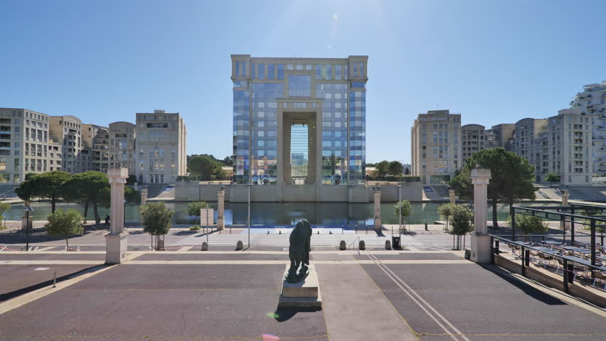 Glass building on Montpellier sunny day France fix shot  Royalty-Free Stock Footage #1098447639