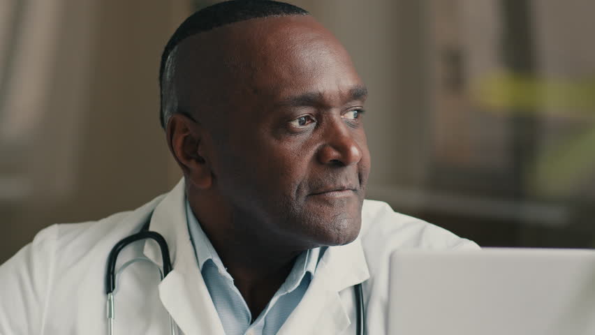 Portrait african american ethnic elderly man mature doctor practitioner specialist therapist cardiologist dermatologist medical worker male specialist show ok gesture recommend good healthcare service Royalty-Free Stock Footage #1098449537