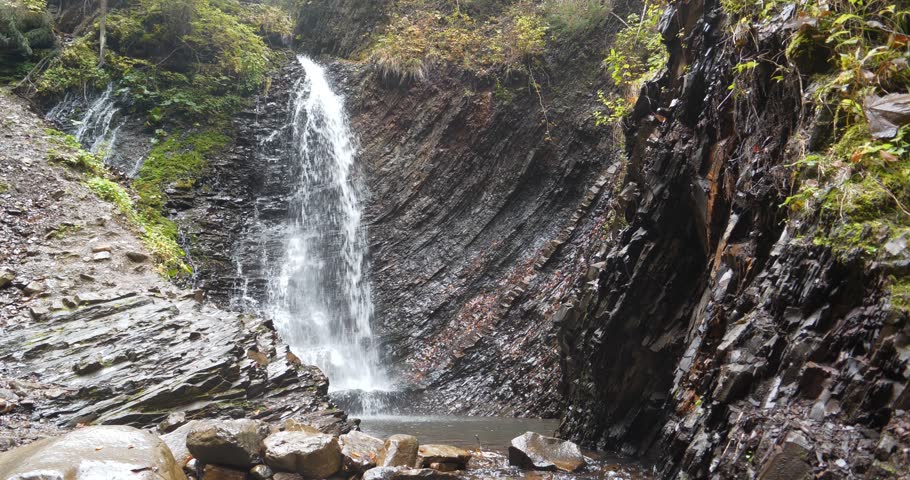 Waterfall Zhenetskyi Huk or Huk waterfall on Zhenets river, Carpathian National Park, Gorgany mountain ridge, western Ukraine. Cinema 4K 60fps video | Shutterstock HD Video #1098458135