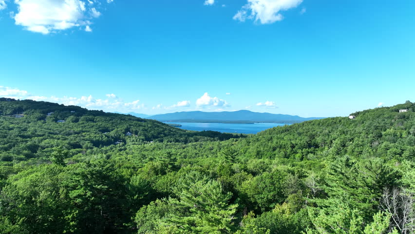 Mountain forest flying towards Lake Winnipesaukee.