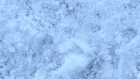 macro overhead closeup view of rock salt ice-melt on concrete with snow - Powered by Shutterstock - Get 15% off with code: PIKWIZARD15