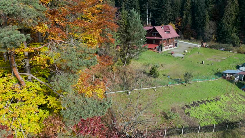 Mountain shelter. Aerial shot, autumn