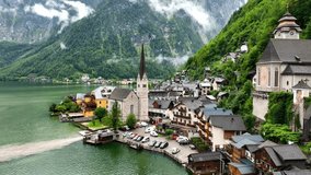 Hallstatt town in Austria, aerial view of unesco work heritage site in Austria with Austrian Alps and a lake, romantic village of Hallstatt in Europe. High quality 4k footage