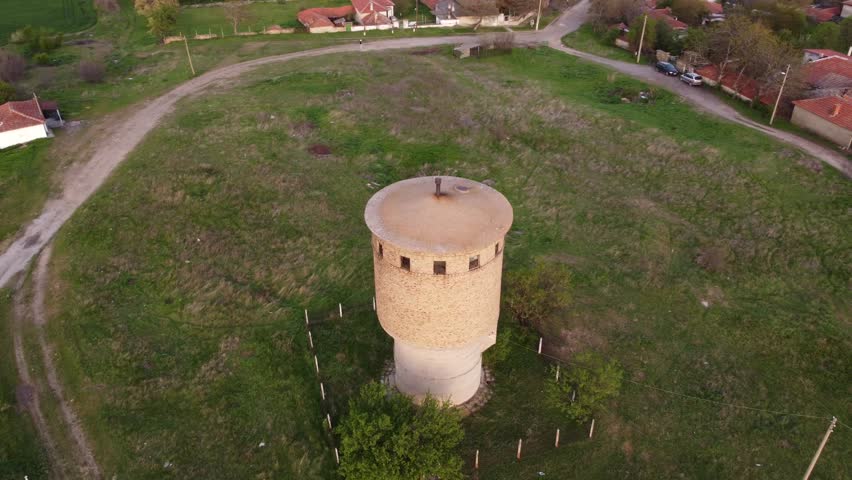 Water tower in the countryside. Top view.