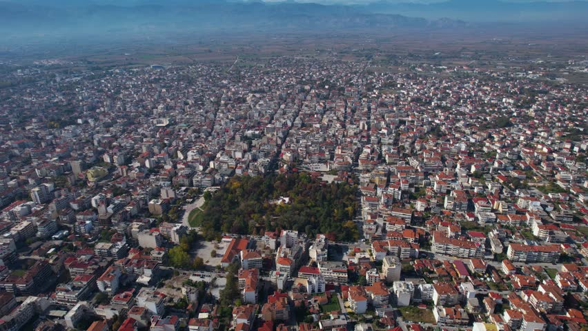 Aerial view of the city Karditsa in Greece on a cloudy day in afternoon
