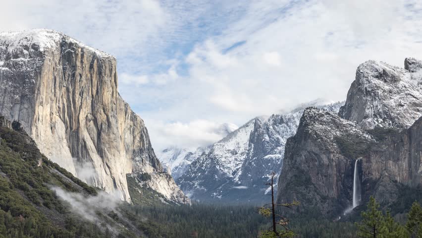 Time lapse of a snowy winter landscape looking down Yosemite Valley in Yosemite National Park