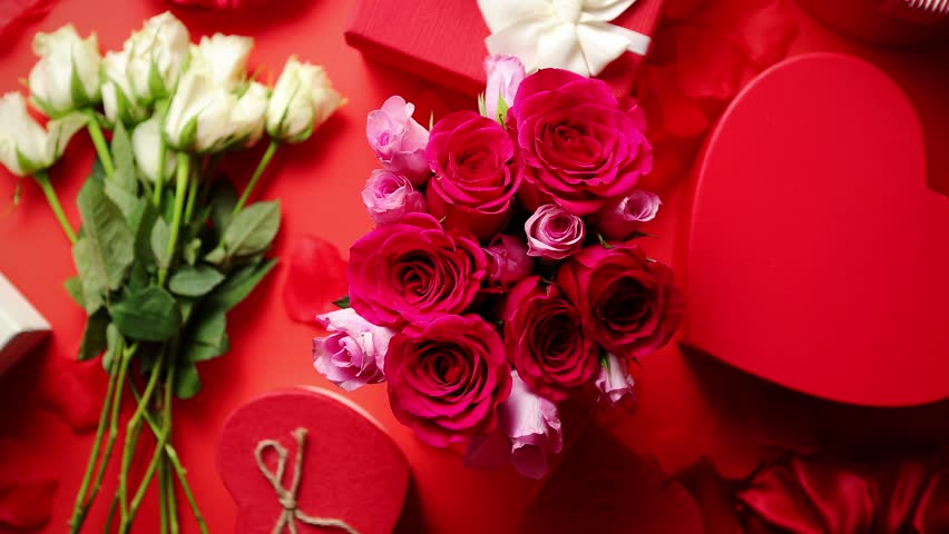 Valentines day romantic decoration with roses, boxed gifts, candles