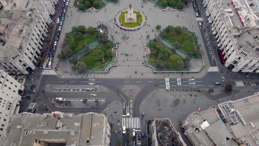 Aerial top down over Plaza San Martin in Lima with monument to Jose De San Martin in center of square, Peru