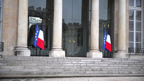 Paris, France - Circa 2019: Pedestrians walking near burned luxury