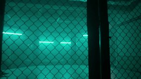 MMA fighters enter the cage ring. Mixed martial arts fight. Cinematic staged fight. Boxing in a ring or cage. Two fighters fight for the right to be the champion. - Powered by Shutterstock - Get 15% off with code: PIKWIZARD15