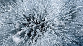 Frozen methane bubbles and cracks in the ice on Lake Baikal Siberia Russia. Natural cold background of ice. Winter abstract background. High quality 4k footage - Powered by Shutterstock - Get 15% off with code: PIKWIZARD15