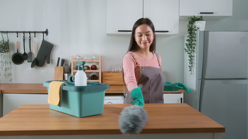 Happy Asian young woman sweeping sofa and furniture to cleaning house, healthy lifestyle concept | Shutterstock HD Video #1098538239