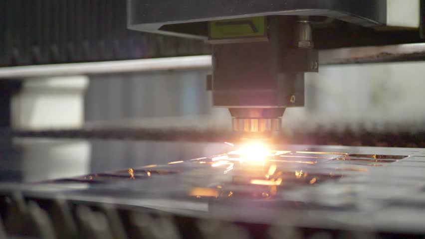 Laser cutting technology of flat sheet metal steel material processing with sparks on manufacture. Metal cutting or lathe work concept | Shutterstock HD Video #1098542077