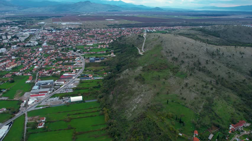 Aerial view of the city Podgorica in Montenegro on a cloudy afternoon in autumn.
