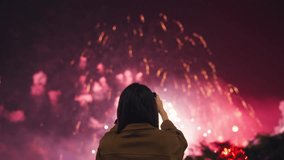Woman record video incredible new year festivity celebration fireworks on smartphone for upload to social media, Festive holiday