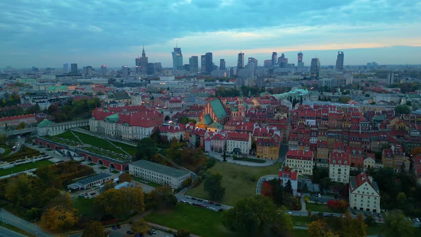 Beautiful aerial scenery of historic old town buildings and ancient cathedral, European architecture in Warsaw, Poland. Night