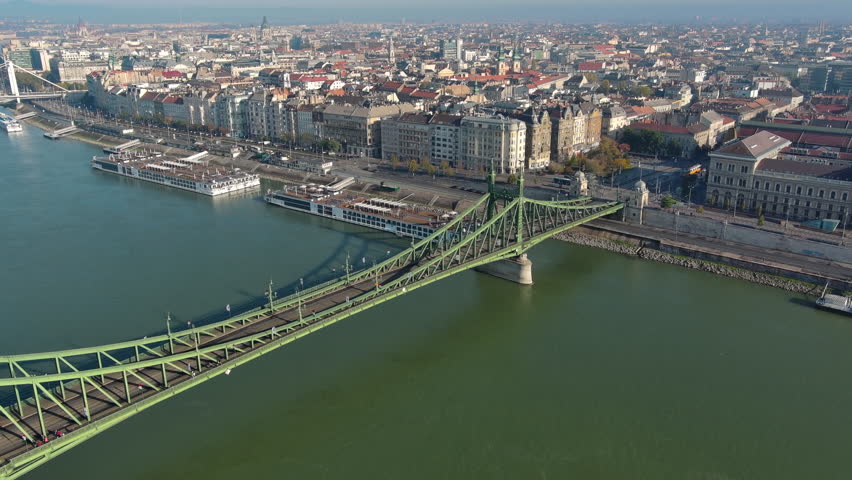 Establishing Aerial View Shot of Budapest, Hungary. Szabadság híd, Liberty Bridge or Freedom Bridge, connects Buda and Pest across the River Danube