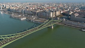 Establishing Aerial View Shot of Budapest, Hungary. Szabadság híd, Liberty Bridge or Freedom Bridge, connects Buda and Pest across the River Danube