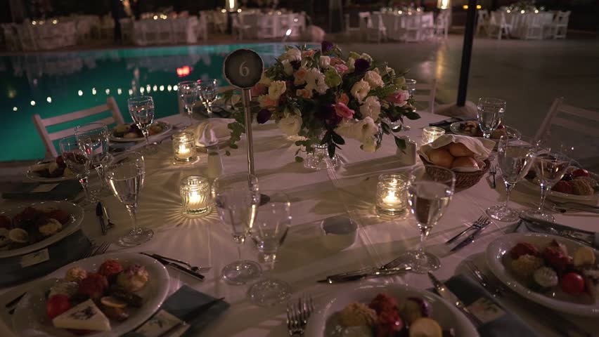 The elegant wedding table ready for guests. | Shutterstock HD Video #1098560091