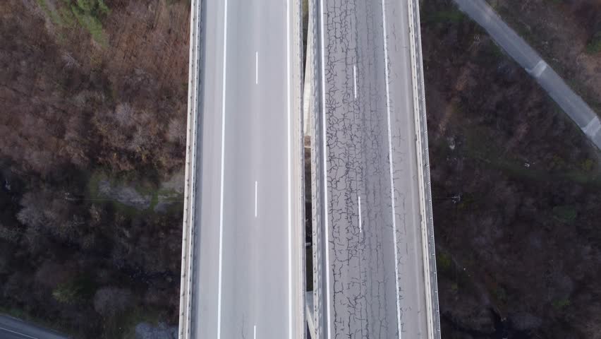 Flight over highway. Tall bridge. Drone shots.