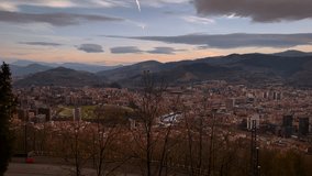 View of Bilbao city at sunset from Artxanda viewpoint, Basque Country, Spain. High quality 4k footage